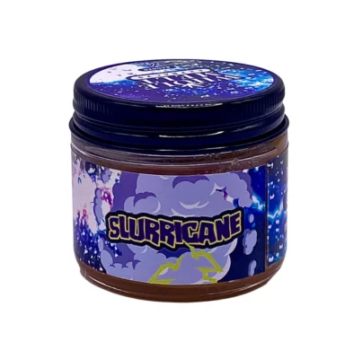 Creamy golden hue of authentic Whole Melt Slurricane edition Extracts badder concentrate inside a premium glass jar.