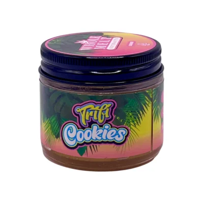 Rich golden sheen of authentic Whole Melt Trifi Cookies Extracts badder concentrate stored in a premium glass jar.